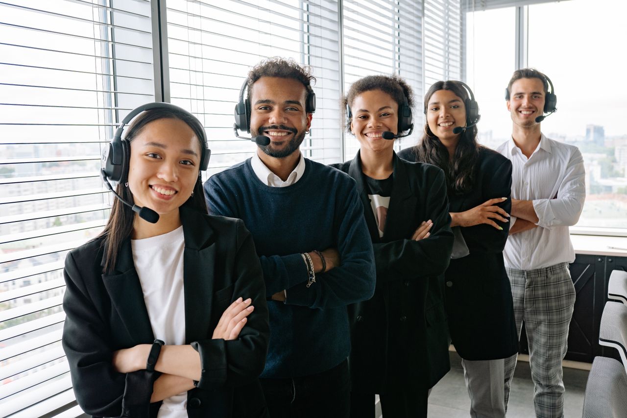 Sales development team wearing headsets